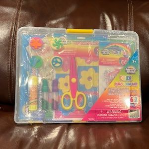 NWT, sealed, Rainbow World 62 piece Deluxe Scrapbooking case set
